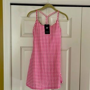 Halara tennis dress. One piece with shorts. Runs a bit long,approx 30.5”.